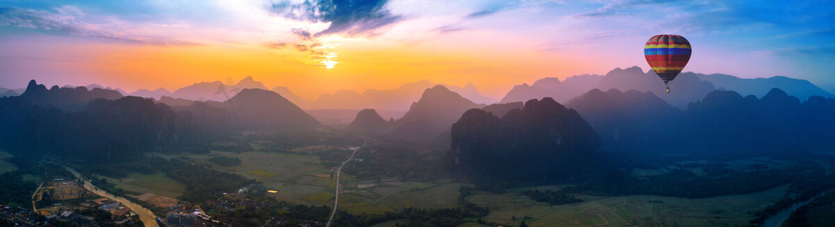 风景鸟瞰万荣山和气球在日落风景夏天老挝