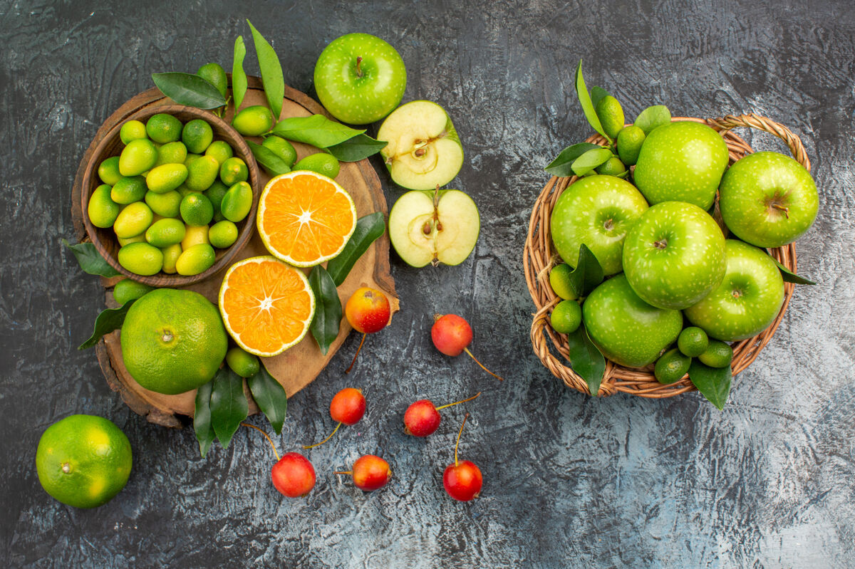 柠檬从远处俯瞰苹果板篮上开胃的柑桔和樱桃饮食可食用水果新鲜