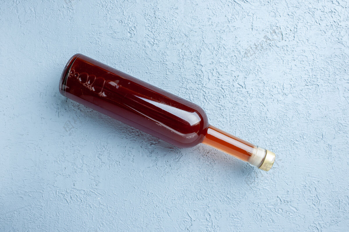顶部顶视图苹果醋在瓶子上白色背景果汁彩色照片红色新鲜饮料酸的食物视图果汁钢笔