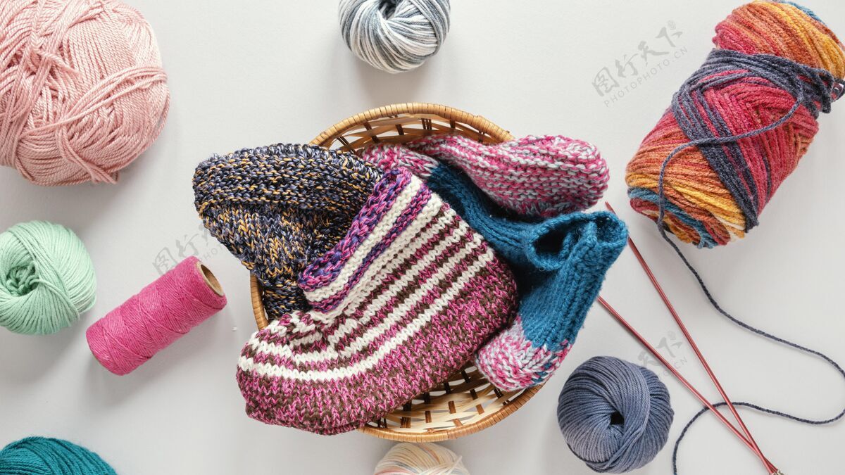 纺织品把编织针和羊毛放在篮子里纹理针织针编织机