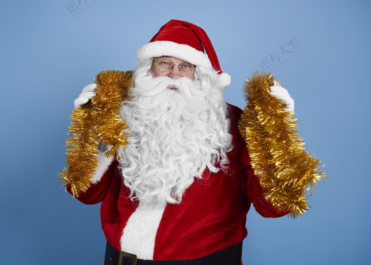 装饰圣诞老人画像和圣诞装饰有举行圣诞老人