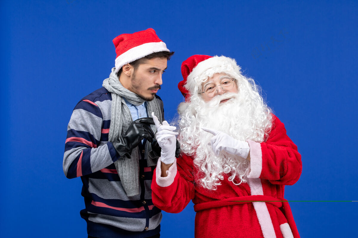圣诞老人前视图圣诞老人和年轻的男性男人人们肖像